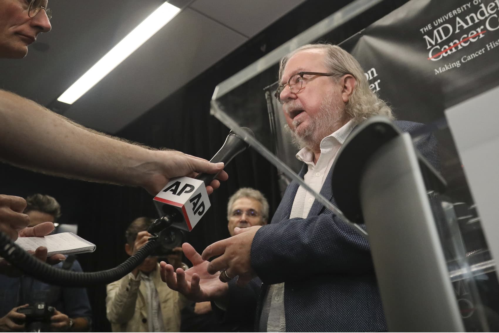 James Allison, one of the 2018 Nobel Prize winners for medicine, speaks to members of the media Monday, Oct. 1, 2018, in New York. Allison and Tasuku Honjo won the Nobel Prize in medicine on Monday for discoveries that help the body marshal its cellular troops to attack invading cancers. (AP Photo/Bebeto Matthews)