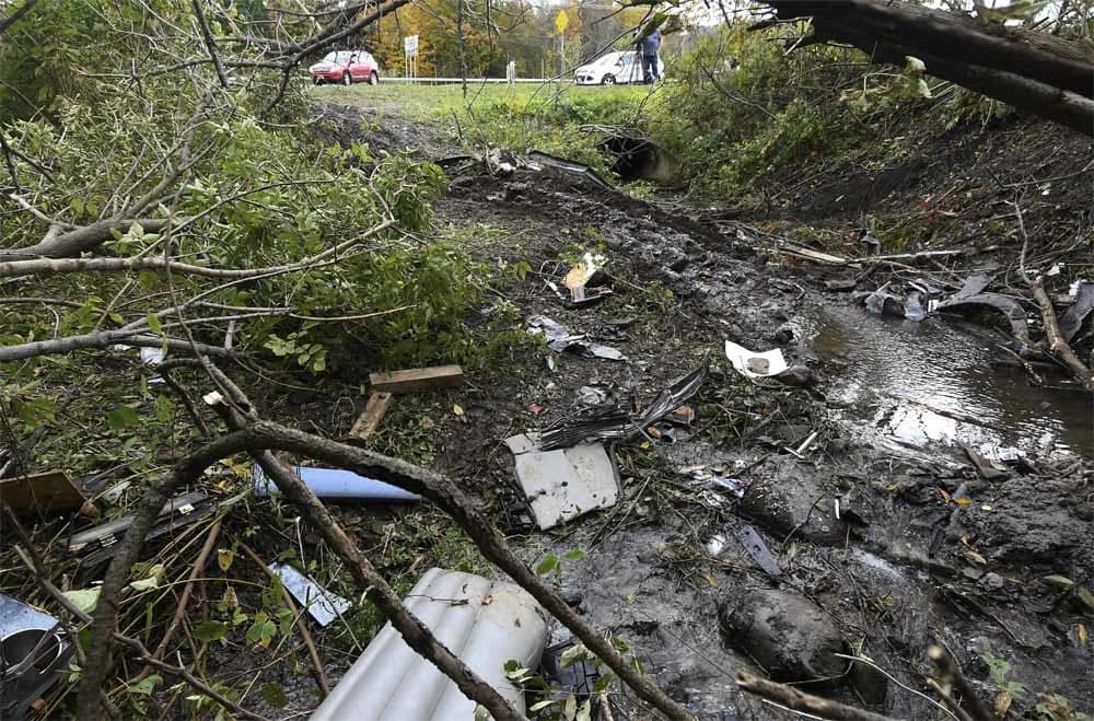 Debris scatters an area Sunday, Oct. 7, 2018, at the site of yesterday's fatal crash Schoharie, N.Y. (Hans Pennink/AP)