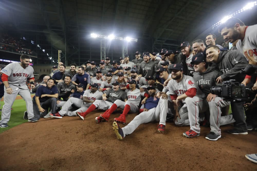 The Boston Red Sox pose for a picture after winning the American League Championship Series. (Frank Franklin II/AP)