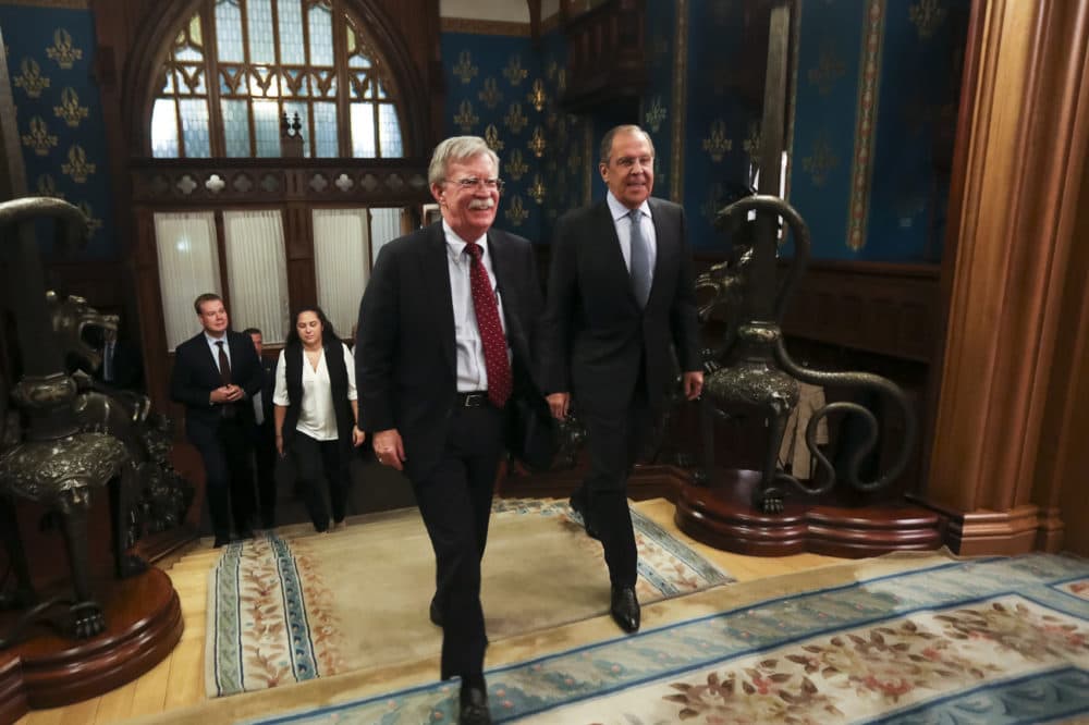 U.S. National Security Adviser John Bolton, left, and Russian Foreign Minister Sergey Lavrov enter a hall for their talks in Moscow, Russia, Monday, Oct. 22, 2018. U.S. President Donald Trump's national security adviser has met with top Russian officials after Trump declared he intended to pull out of a 1987 nuclear weapons treaty. (Russian Foreign Ministry Press Service via AP)