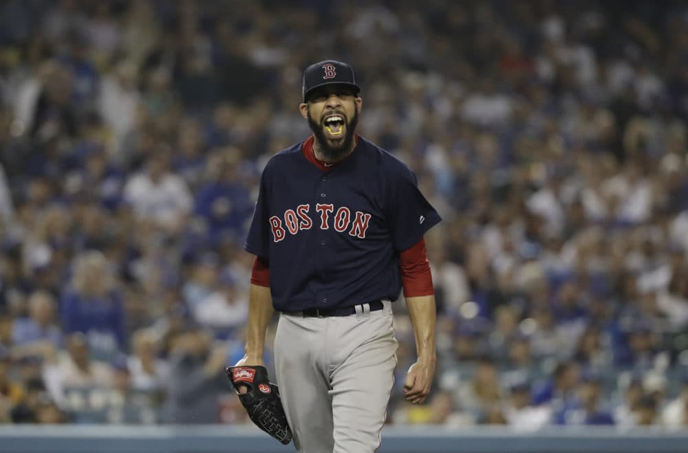 Red Sox pitcher David Price celebrates the end of the seventh inning in Game 5 of the World Series. (David J. Phillip/AP)