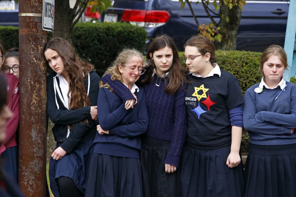 Students pay their respects to Dr. Jerry Rabinowitz, one of 11 people killed while worshipping at the Tree of Life Synagogue on Saturday Oct. 27, 2018.  (Gene J. Puskar/AP)