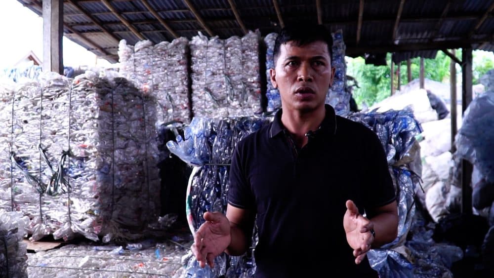 Nyoman Adi Artana at a plastic-bottle packing plant in Bali, Indonesia. (Courtesy of Niall Macaulay)