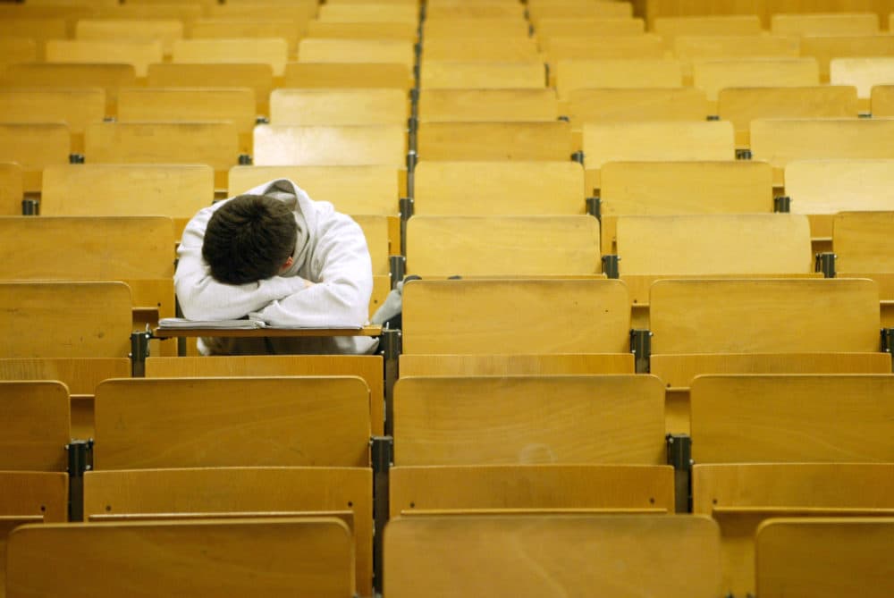 A student naps in a lecture hall in Berlin, Germany on Jan. 13, 2003. (Sean Gallup/Getty Images)
