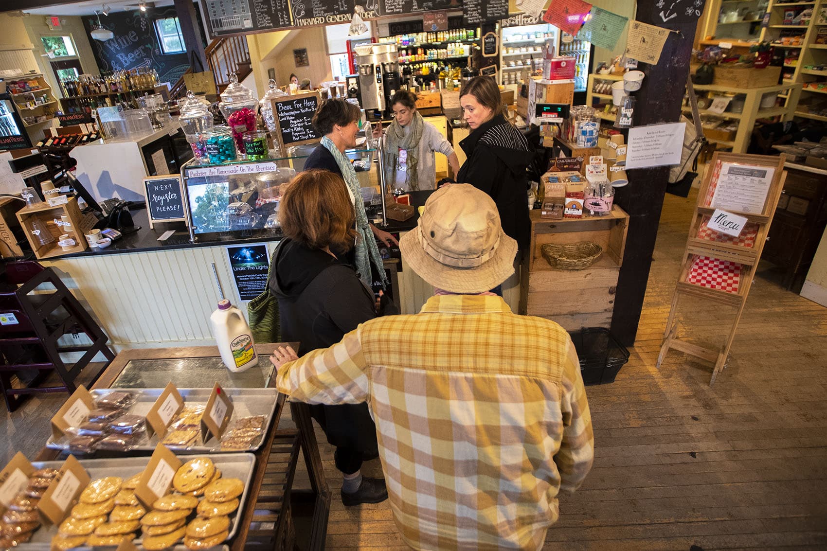 Patrons wait in line at the General Store in Harvard, Massachusetts.(Jesse Costa/WBUR)