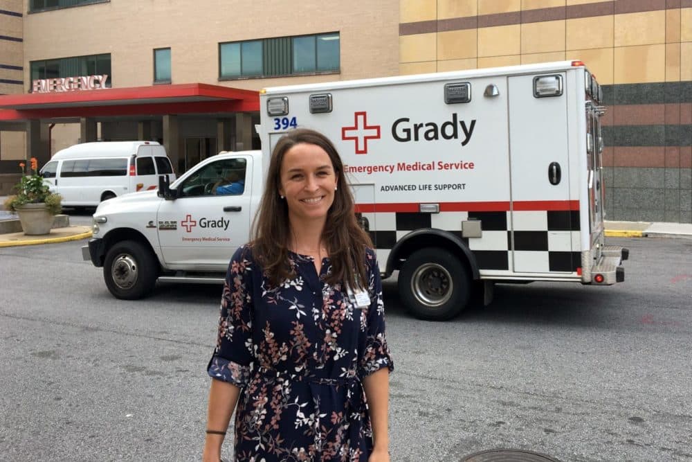 Dr. Lauren Hudak, seen here, treats patients at Atlanta’s Grady Memorial Hospital’s emergency department. She’s also an emergency medicine professor at Emory University in Atlanta. She’s currently researching how patients feel about their doctors asking them about guns in the home. (Lisa Hagen/WABE)