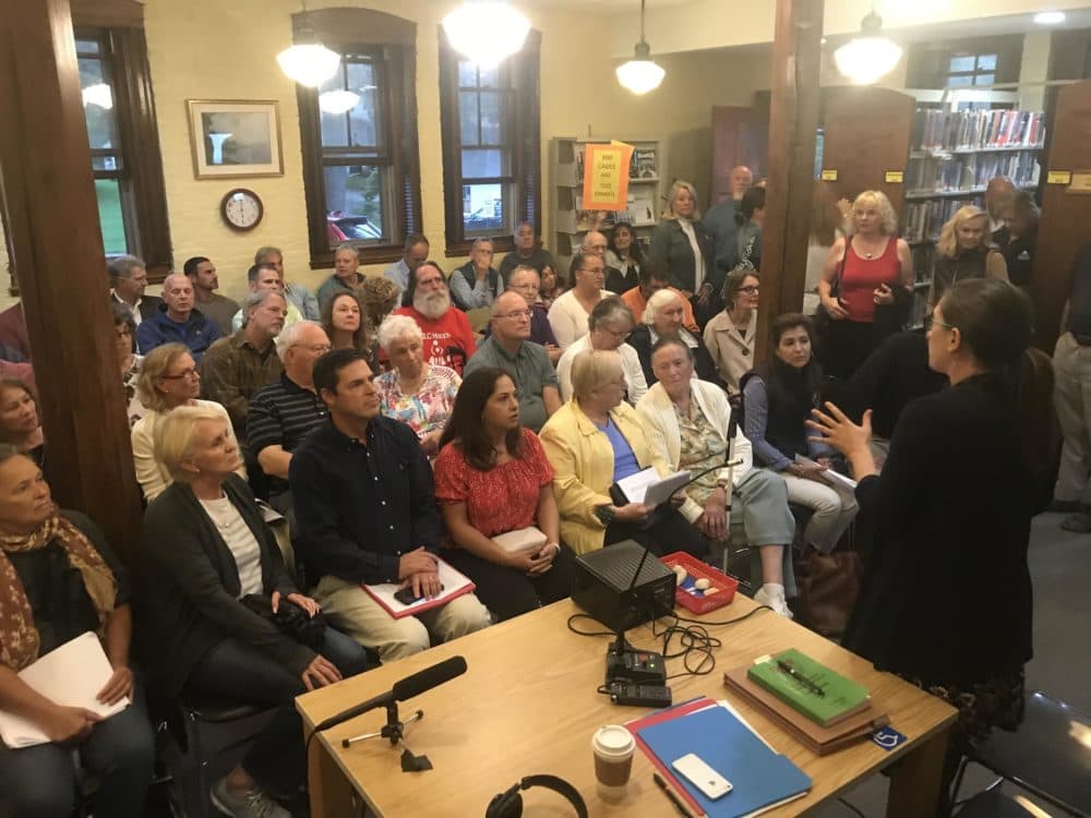 So many residents of Kittery and nearby towns showed up for a hearing on a proposed shellfish-farm expansion in Spinney Creek in September, it had to be postponed and rescheduled for a bigger venue. (Fred Bever/Maine Public Radio)