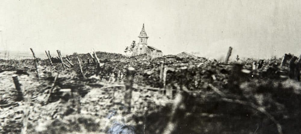 German shells falling on a church, Rambucourt, France. April 20, 1918. (Massachusetts National Guard Archives)
