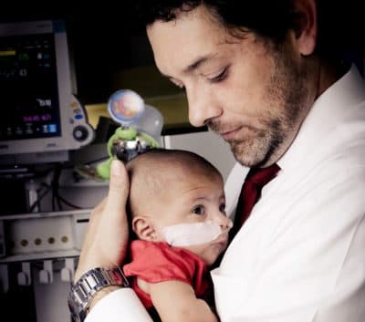 Jason Rosenberger holds his daughter, Aubree Lynn Rosenberger. (Courtesy of Kristy Williams, Dimples Photography Atlanta)