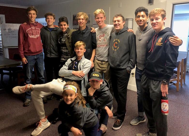 Paradise High School senior and cross-country runner Gabe Price (fourth from left) is joined by Charlie Giannini (left) and other members of the Chico High School varsity cross-country team at KHSU public radio in Arcata, Calif. (Courtesy of Gabe Price)