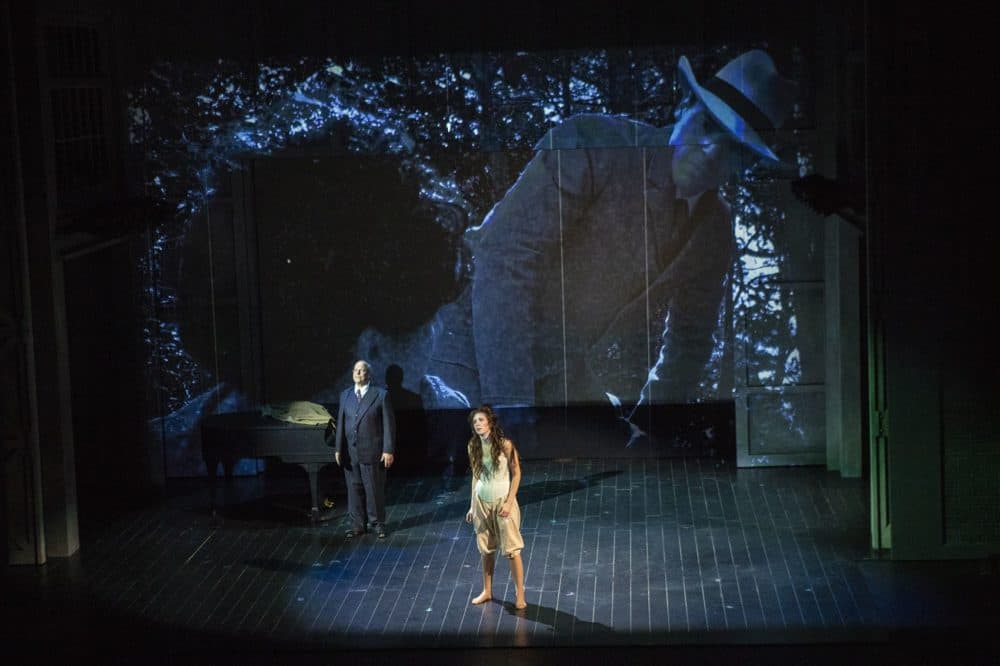 Sara Womble portrays the girl and Omar Ebrahim as Schoenberg in a scene of &quot;Schoenberg In Hollywood&quot; during a dress rehearsal at the Paramount Theater. (Jesse Costa/WBUR)