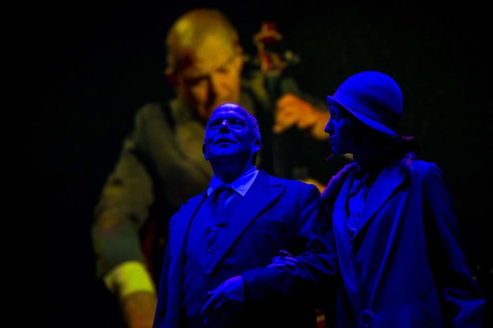 Sara Womble portrays the girl and Omar Ebrahim as Schoenberg in a scene of &quot;Schoenberg In Hollywood&quot; during a dress rehearsal at the Paramount Theater. (Jesse Costa/WBUR)