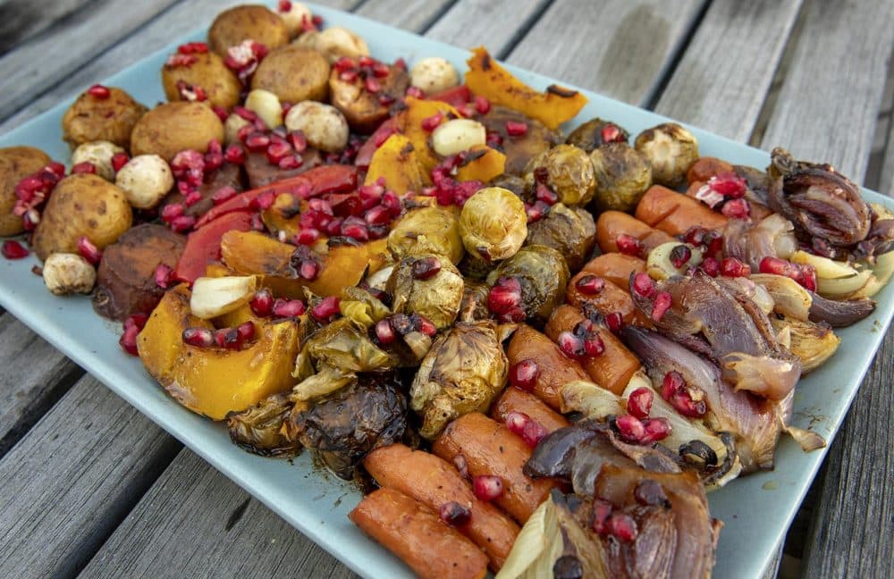 Roast vegetables with a pomegranate vinaigrette and pomegranate seeds, from chef Kathy Gunst. (Robin Lubbock/WBUR)