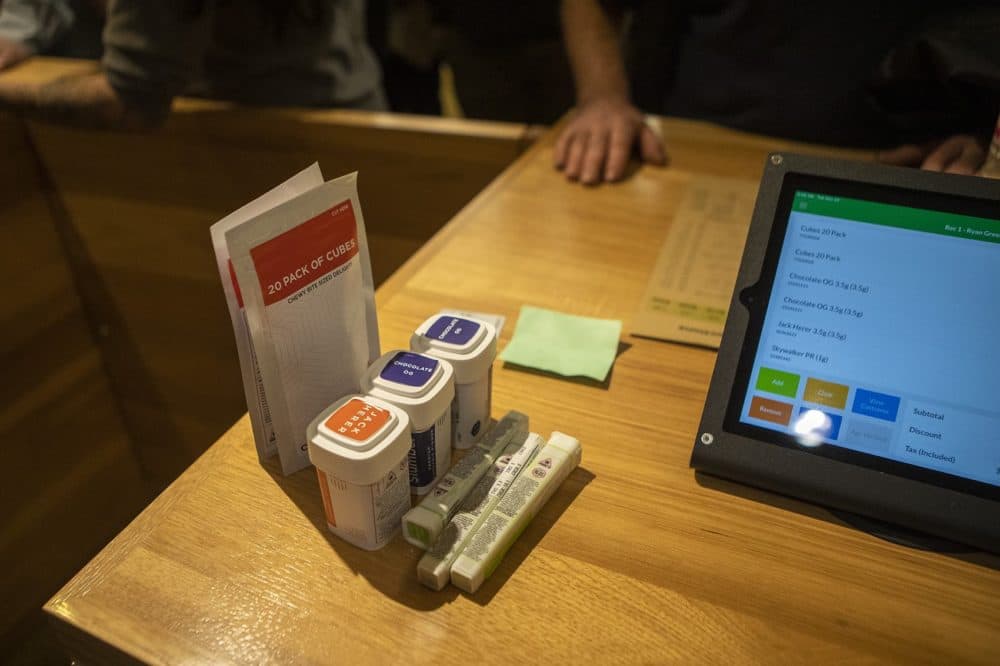 Some marijuana products sit on the counter as they are rung up for sale at Cultivate. (Jesse Costa/WBUR)