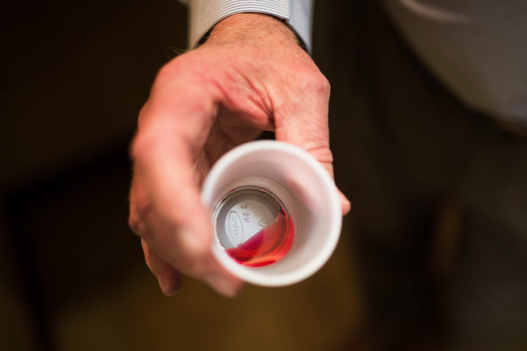In this 2017 file photo, the CEO of a methadone clinic holds a 35 mg liquid dose of methadone in Rossville, Ga. (Kevin D. Liles/AP)