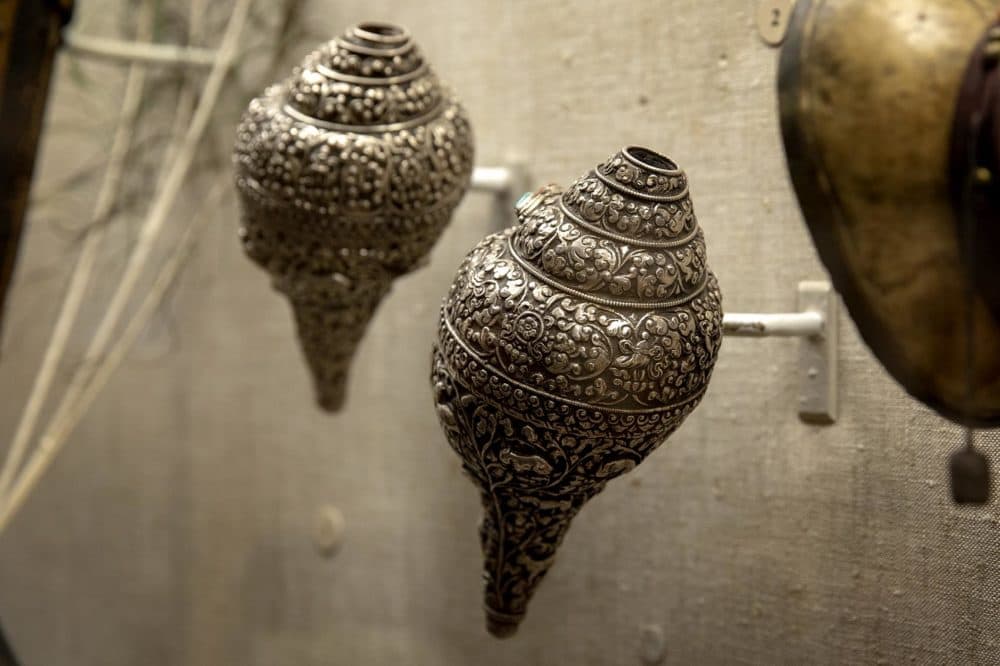 Silver seashell trumpets, probably made in Tibet in the late 19th century. (Robin Lubbock/WBUR)