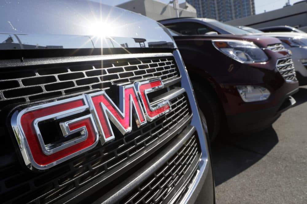 In this April 25, 2017, photo, a GMC truck sits in a General Motors dealer's lot in Nashville, Tenn. (AP Photo/Mark Humphrey)