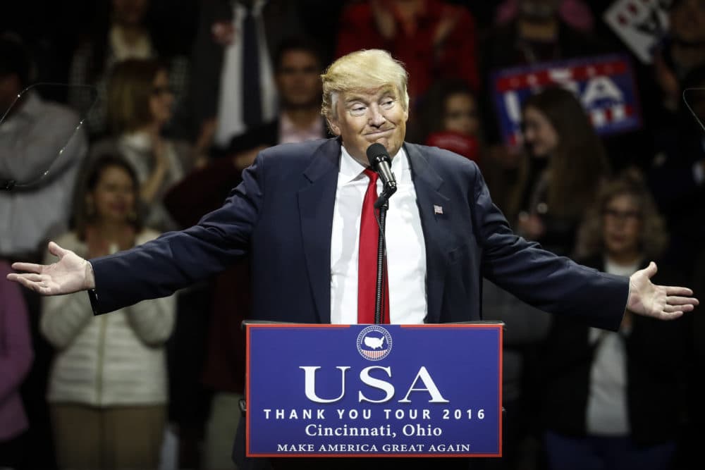 In this Dec. 1, 2016 file photo, then-President-elect Trump gestures as he speaks during the first stop of his post-election tour in Cincinnati. (John Minchillo/AP)