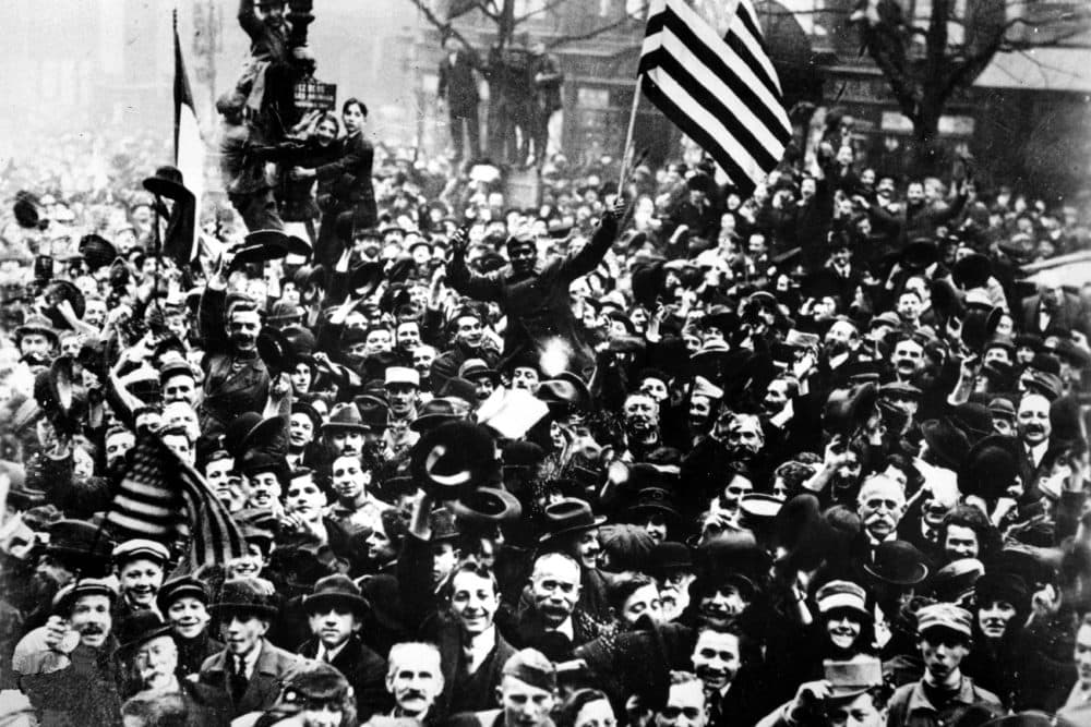 Americans join the celebration on the Grand Boulevard on Armistice Day for World War I in Paris, France, Nov. 11, 1918. (AP Photo)