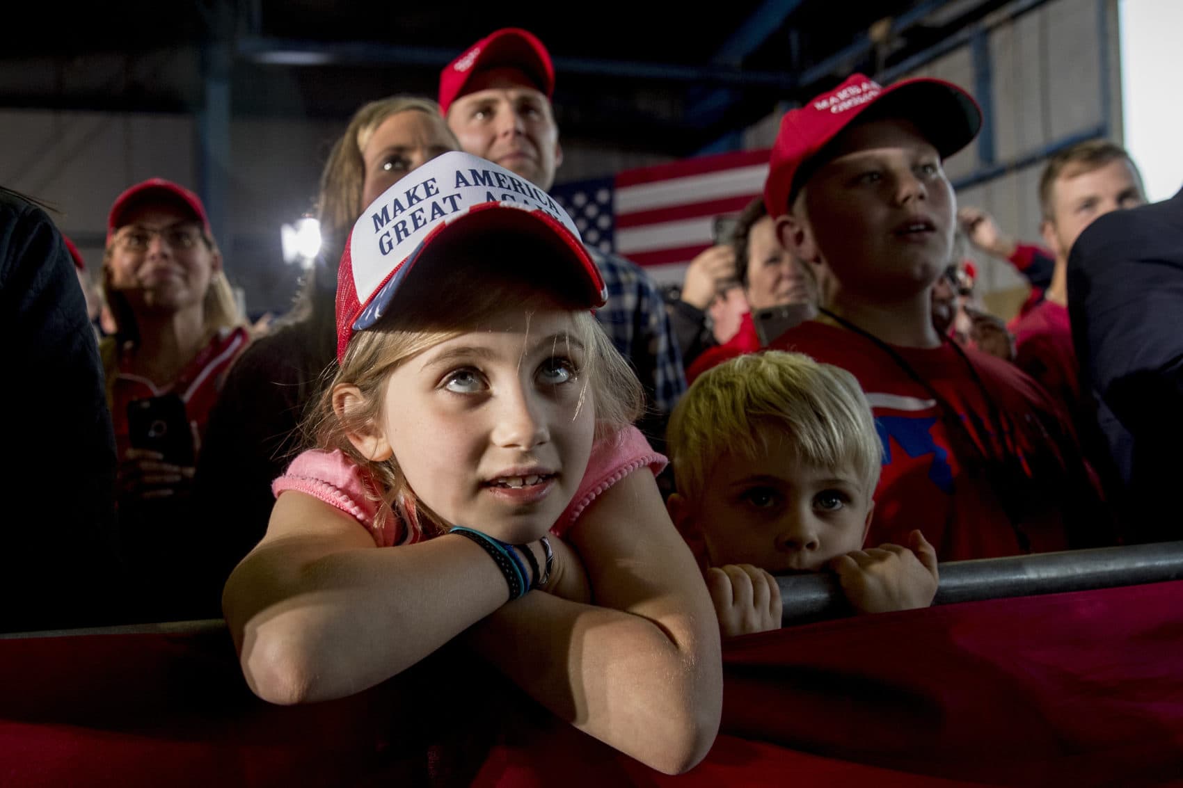 Children in the audience listen as President Donald Trump speaks at a rally at Southern Illinois Airport in Murphysboro, Ill., Saturday, Oct. 27, 2018. (Andrew Harnik/AP)