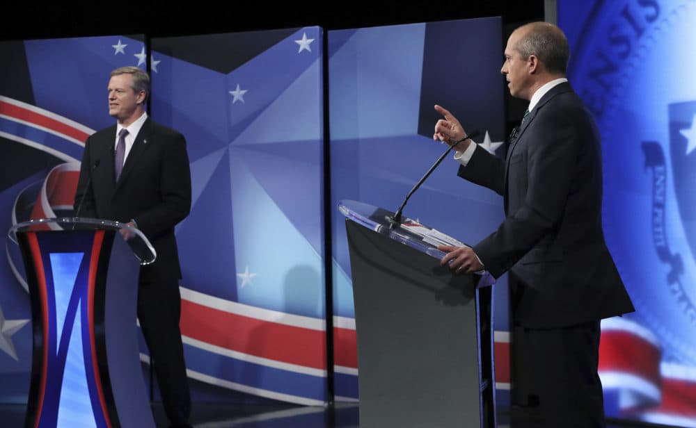 Democratic challenger Jay Gonzalez, right, makes a point during a debate with Republican Gov. Charles Baker Thursday in Needham. (Jim Davis/The Boston Globe via AP, Pool)