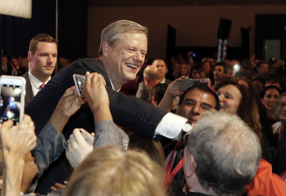 Republican Gov. Charlie Baker greets supporters during an election night rally Tuesday, Nov. 6, 2018, in Boston. (Winslow Townson/AP)