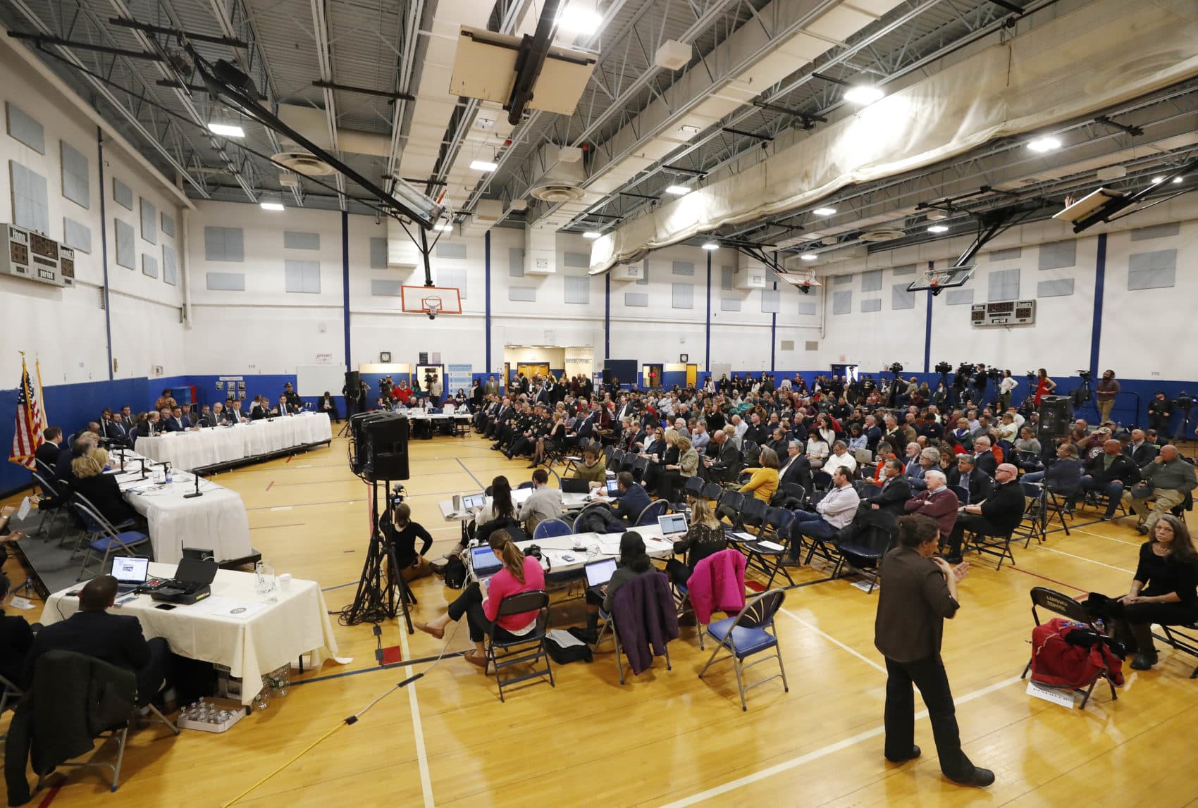 Members of the public gather with members of the Senate Committee on Commerce, Science and Transportation during a hearing on gas pipeline safety with leaders of Columbia Gas and NiSource on Monday in Lawrence. (Winslow Townson/AP)