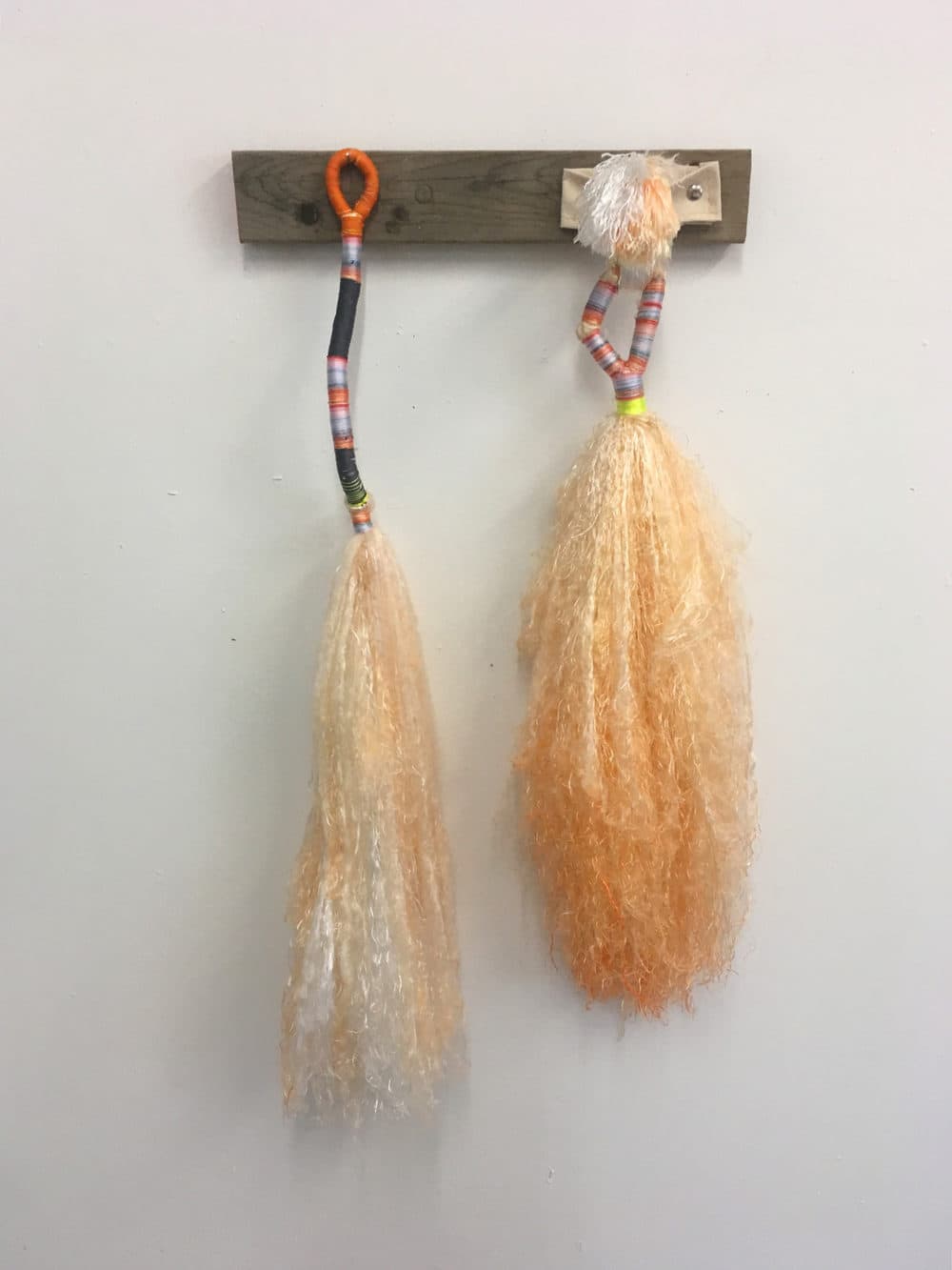 Daniel Zeese's &quot;Two Orange Brooms.&quot; (Courtesy of the artist)