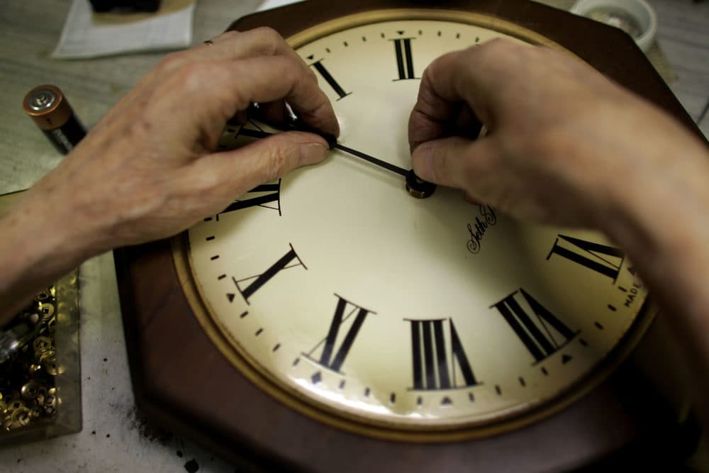 Howard Brown repairs a clock at Brown's Old Time Clock Shop in Plantation, Florida. (Joe Raedle/Getty Images)