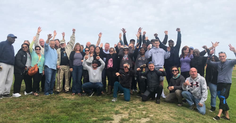 Exonerees, their friends, family and lawyers celebrate at Sky Dive Newport in Middletown, Rhode Island (Bruce Gellerman/WBUR)