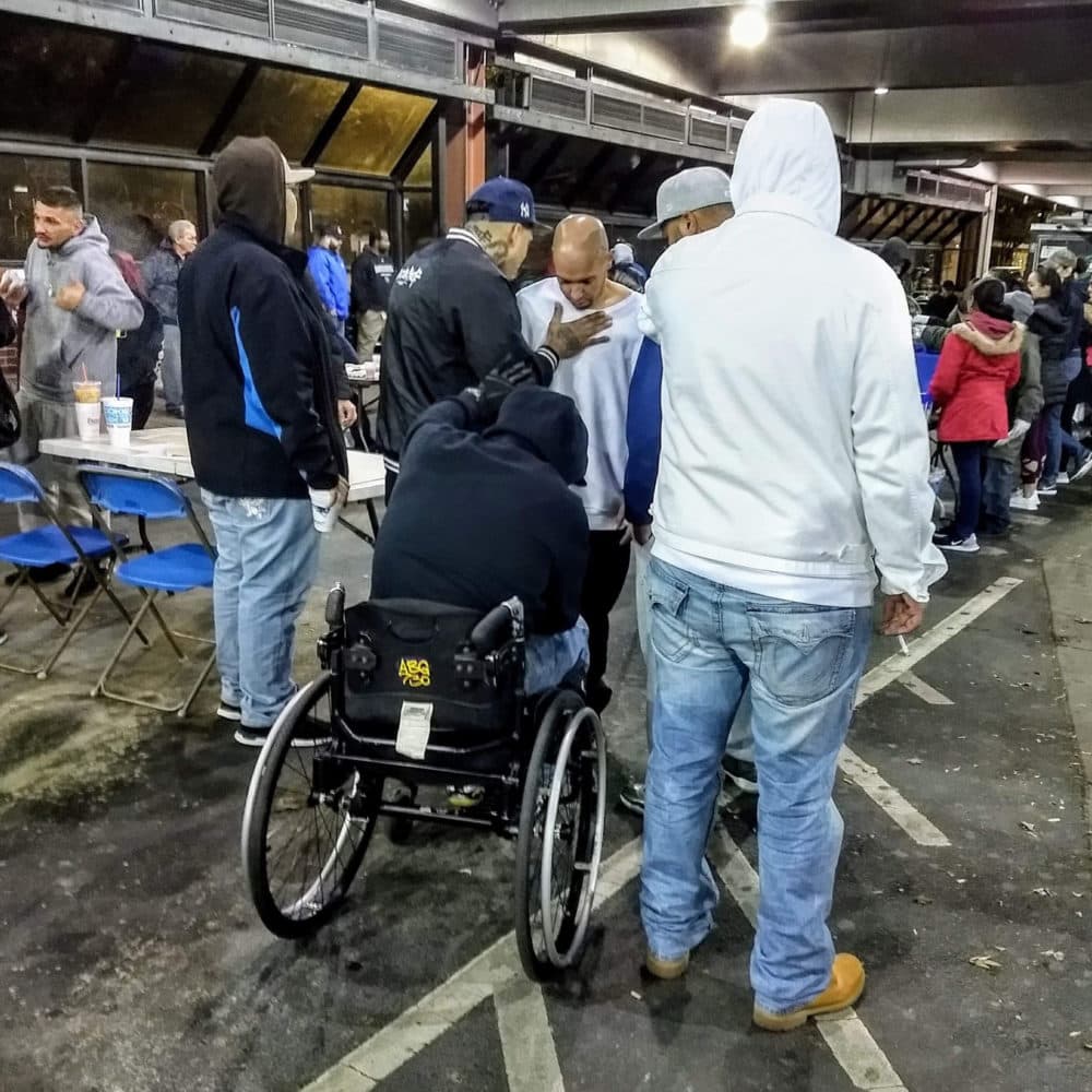 A group called The Movement Family had hosted weekly dinners at the Buckley bus station, where people could also be connected with social services. (Courtesy of Jonathan Stevens)