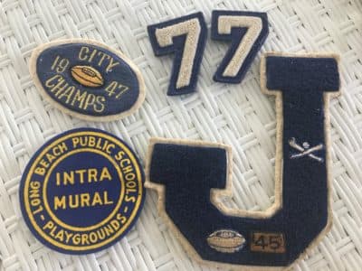 Bill Brannon's high school sports patches. (Susan Valot for WBUR)