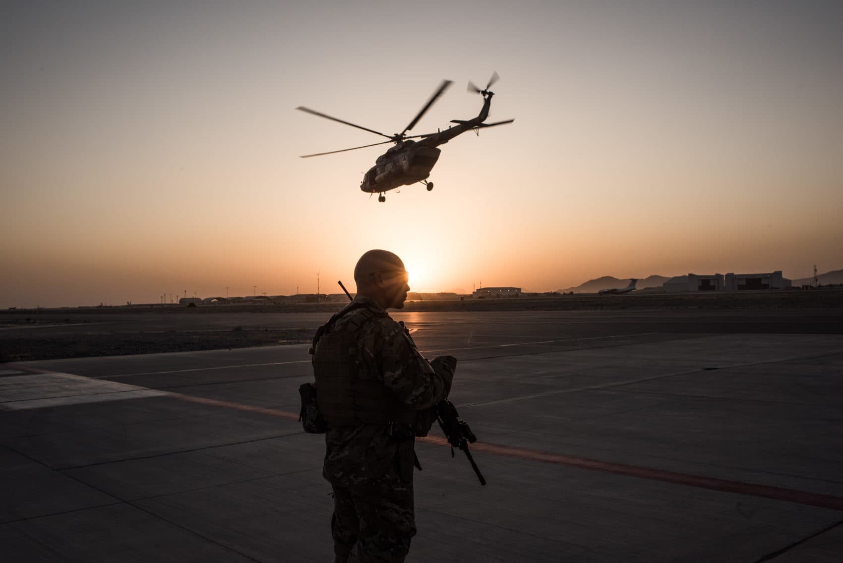 A member of the United States Air Force keeps watch over the runway on Sept. 9, 2017 at Kandahar Air Field in Kandahar, Afghanistan. (Andrew Renneisen/Getty Images)