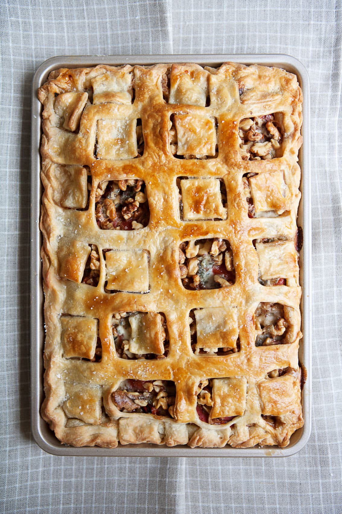 Cathy Barrow's spinach, gorgonzola and walnut slab pie with a cream cheese crust, from "Pie Squared: Irresistibly Easy Sweet & Savory Slab Pies." (Courtesy of Christopher Hirsheimer)