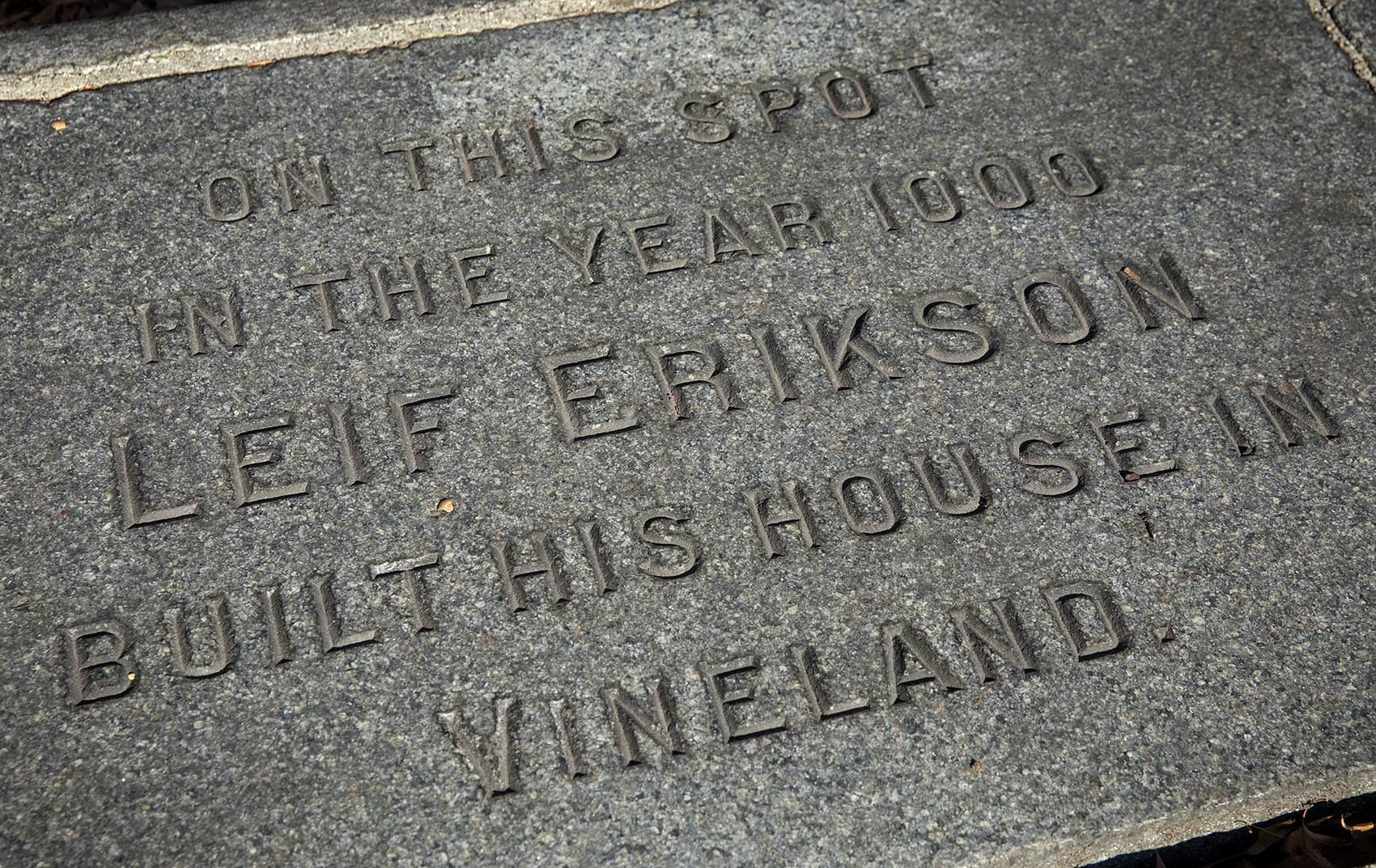 The inscription on the plaque near the Charles reads: “On this spot in the year 1000 Leif Erikson built his house in Vineland.” (Robin Lubbock/WBUR)