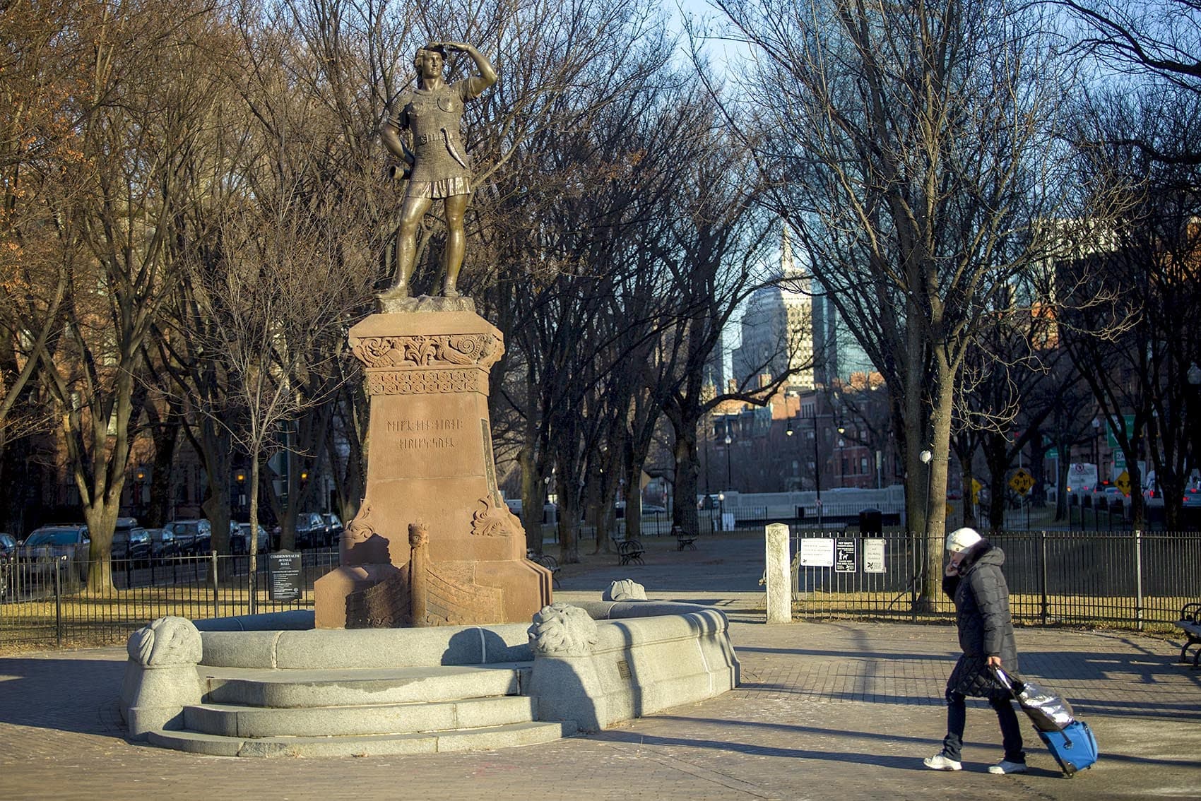 A statue of Leif Erikson looks out across the Muddy River in Charlesgate Park, Boston. (Robin Lubbock/WBUR)