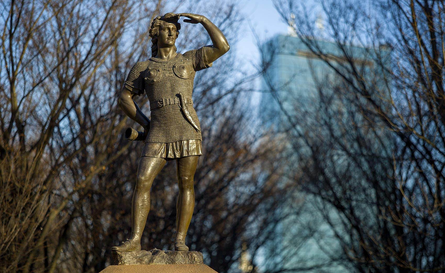 A statue of Leif Erikson looks out across the Muddy River in Charlesgate Park, Boston. (Robin Lubbock/WBUR)
