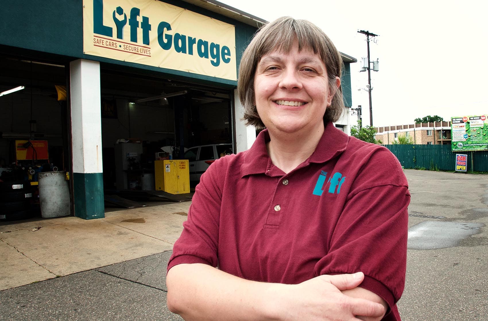 Cathy Heying outside her auto body shop, The Lift. (Peter Molenda)