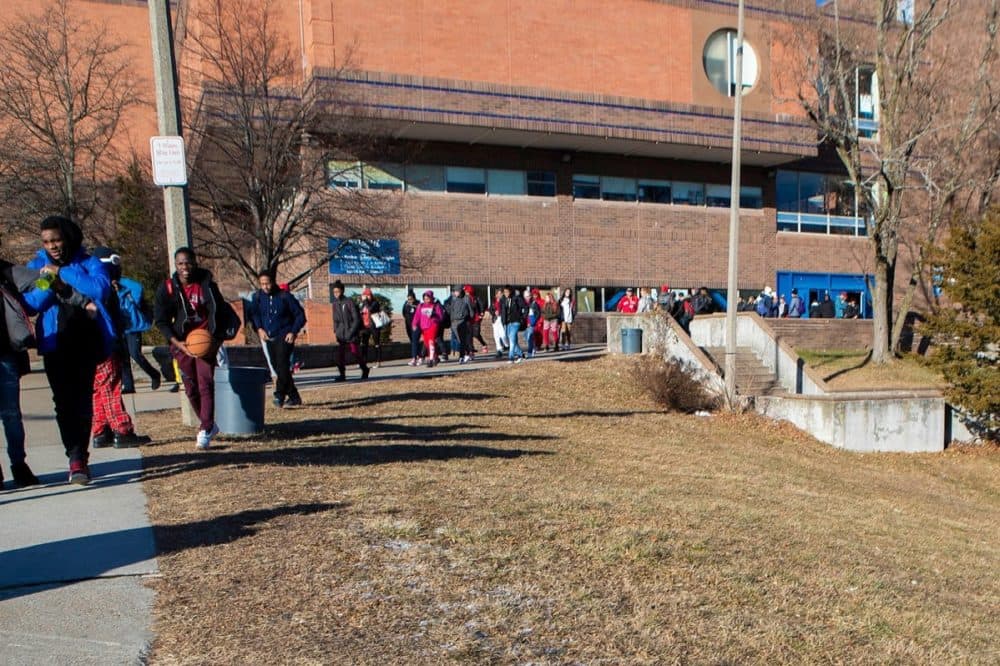 Students leave the West Roxbury Education Complex at the end of the school day. (Jesse Costa/WBUR)