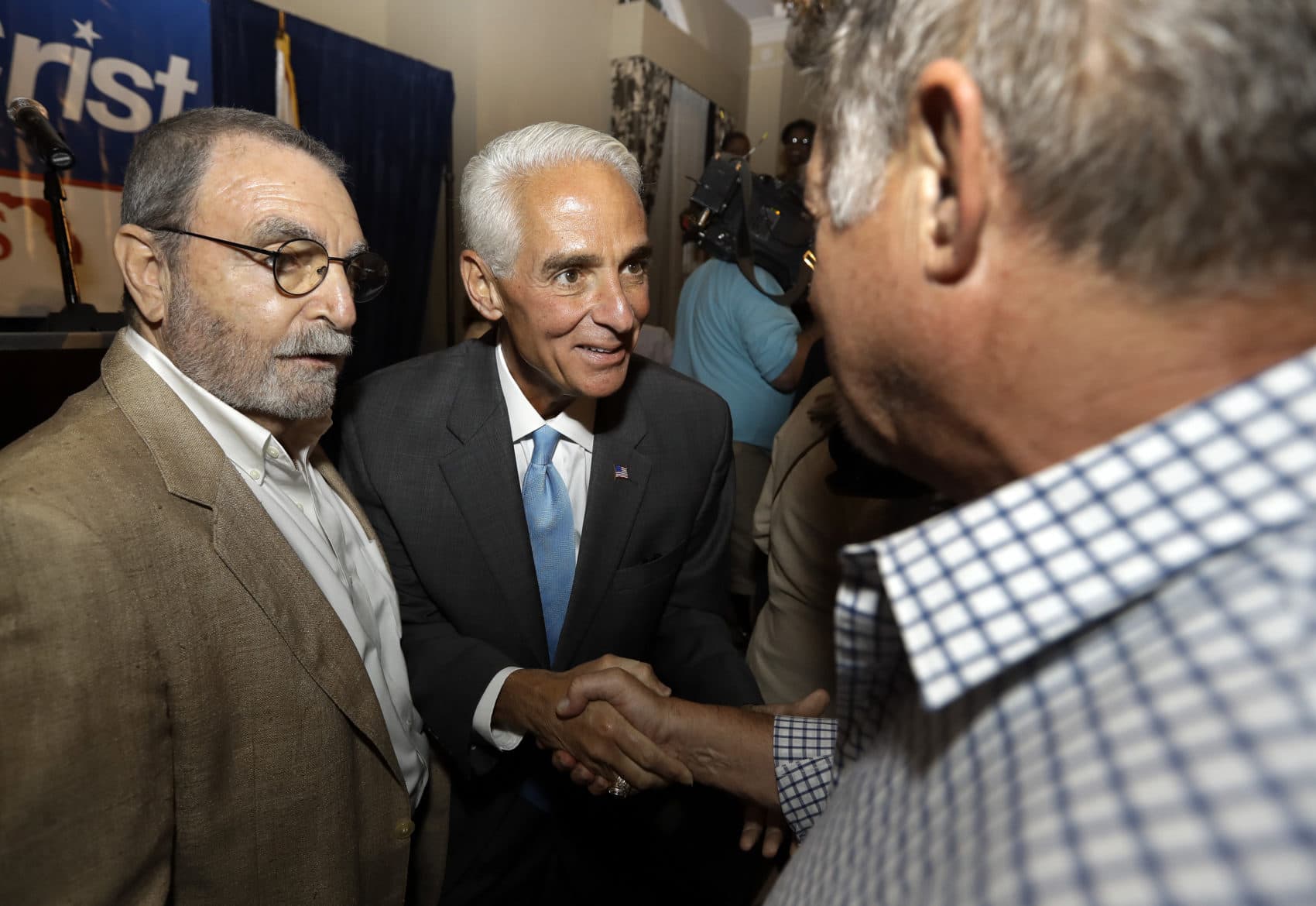 Rep. Charlie Crist, D-Fla., center, shakes hands with supporters after being elected to the U.S. House of Representatives Tuesday, Nov. 8, 2016, in St. Pete Beach, Fla. (Chris O'Meara/AP)