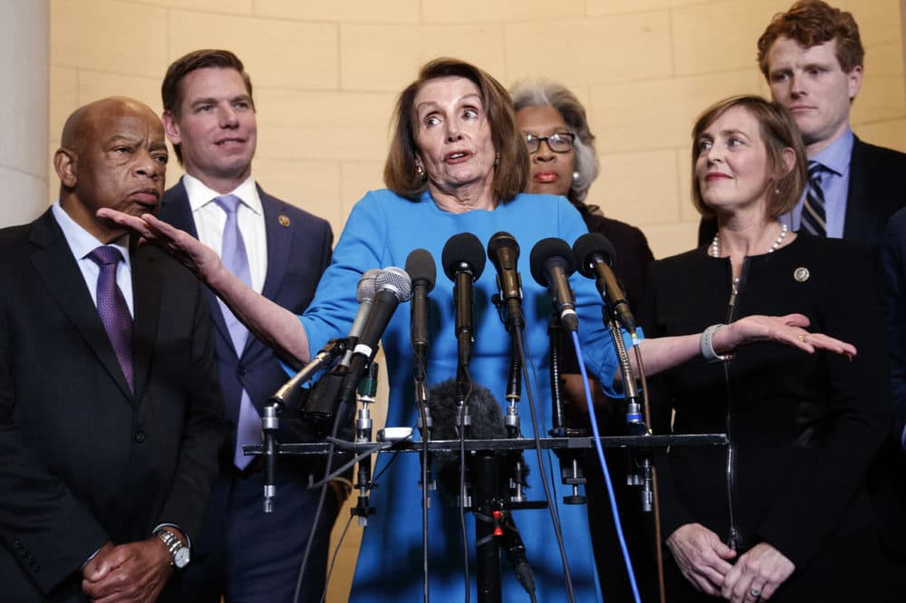 House Minority Leader Nancy Pelosi, D-Calif., joined by from left, Rep. John Lewis, D-Ga., Rep. Eric Swalwell, D-Calif., Rep. Joyce Beatty, D-Ohio., Rep. Kathy Castor, D-Fla., and Rep. Joe Kennedy, D-Mass., gestures as she speaks to media at Longworth House Office Building on Capitol Hill in Washington, Wednesday, Nov. 28, 2018, to announce her nomination by House Democrats to lead them in the new Congress. (Carolyn Kaster/AP)