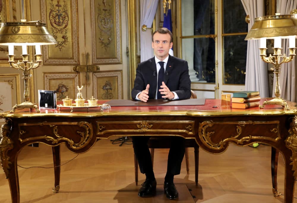 French President Emmanuel Macron poses before a special address to the nation, his first public comments after four weeks of nationwide "yellow vest" protests, at the Elysee Palace, in Paris, on Monday. (Ludovic Marin/AP)