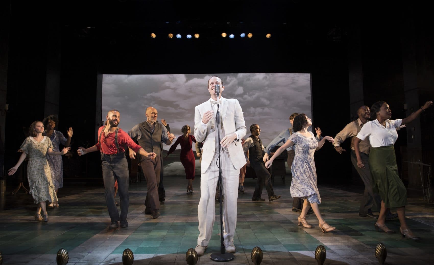 Todd Almond and the cast of “Girl from the North Country” singing “Duquesne Whistle”/”Señor.” (Courtesy of Joan Marcus)