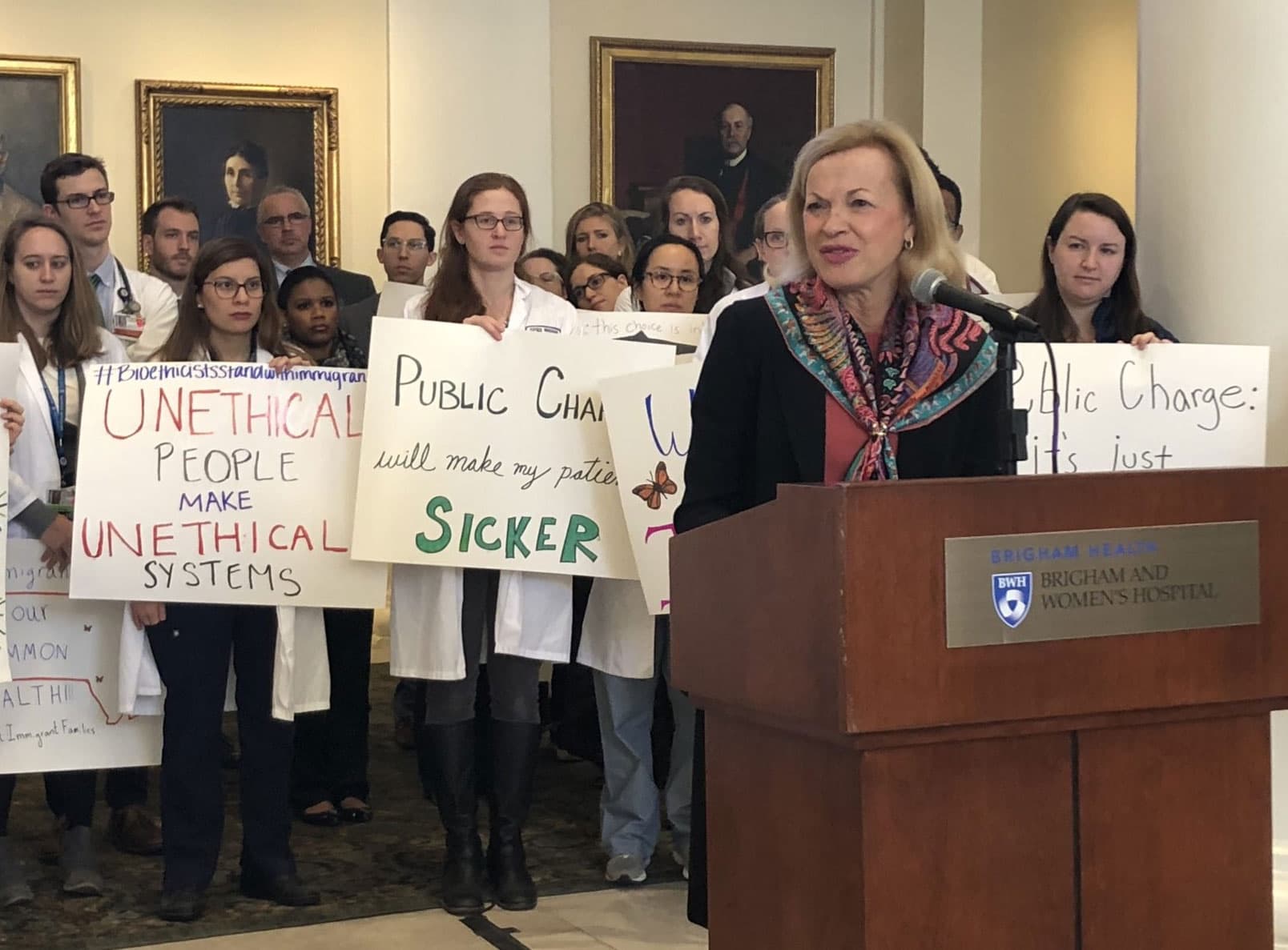 Dr. Betsy Nabel, president of Brigham Health, spoke Tuesday against the Trump administration's proposed changes to the so-called "public charge" rule. (Miriam Wasser for WBUR)