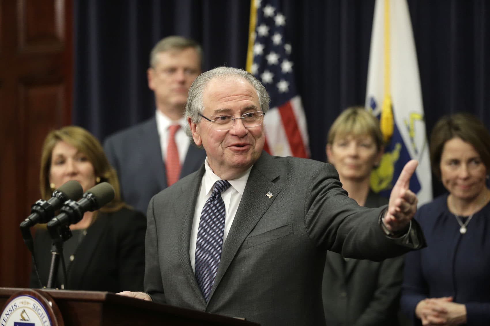 Massachusetts Speaker of the House Robert DeLeo, center, speaks to reporters on Jan. 25, 2016, at the State House in Boston. (Steven Senne/AP)