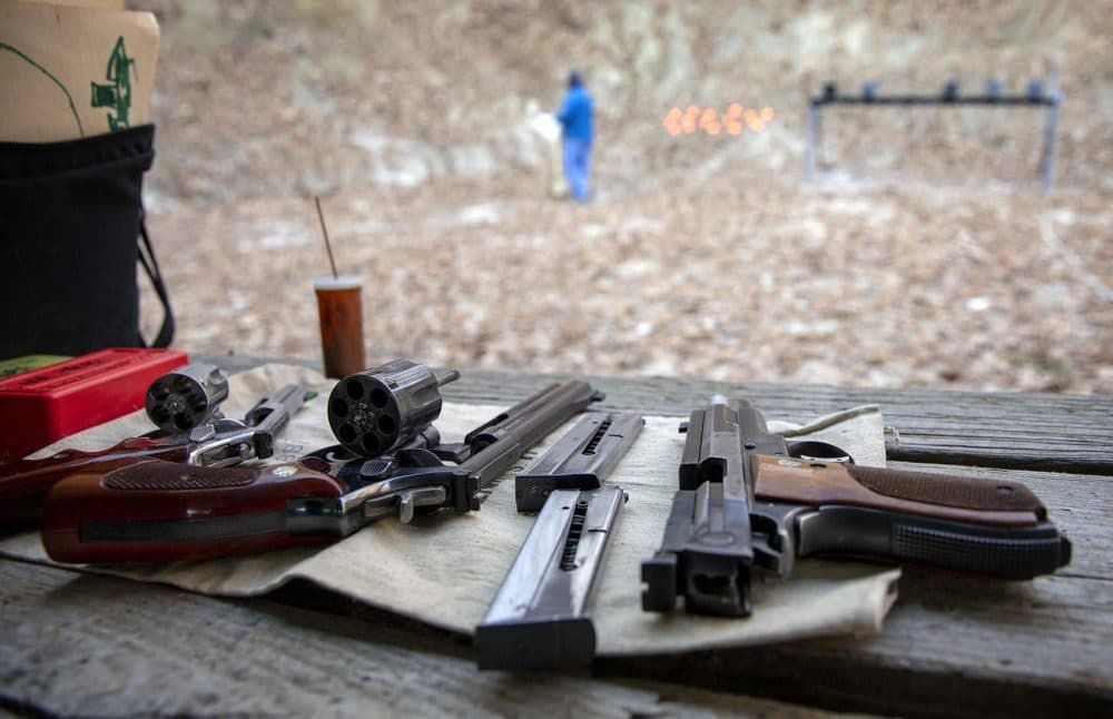 Guns point down a range at the Harvard Sportsmen's Club in Harvard, Mass. (Robin Lubbock/WBUR)