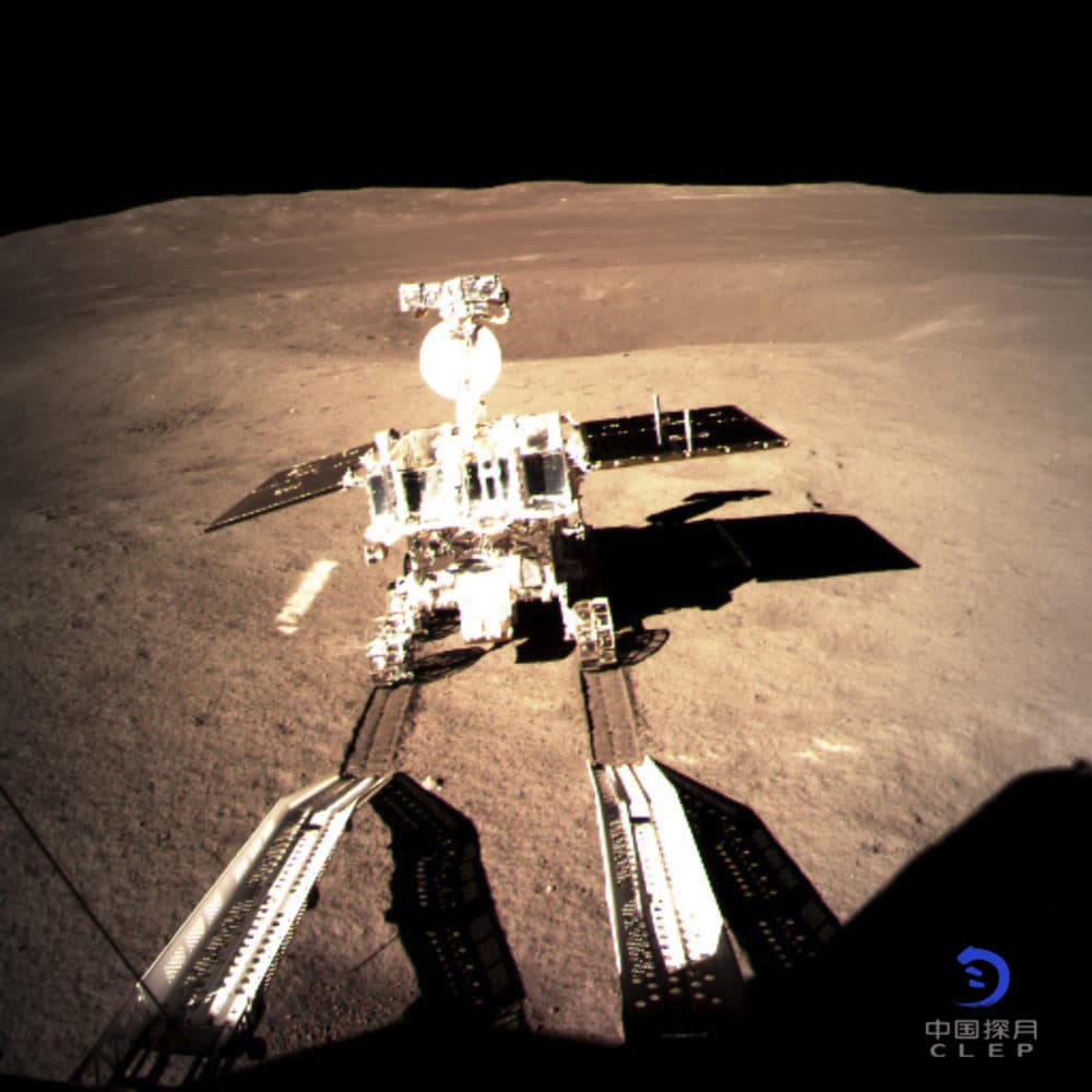 In this photo provided on Thursday, Jan. 3, 2019, by China National Space Administration via Xinhua News Agency, Yutu-2, China's lunar rover, leaves wheel marks after leaving the lander that touched down on the surface of the far side of the moon. (China National Space Administration/Xinhua News Agency via AP)