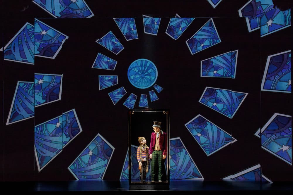 Henry Boshart as Charlie Bucket and Noah Weisberg as Willy Wonka, in &quot;Charlie and the Chocolate Factory.&quot; (Joan Marcus/Courtesy of the production)