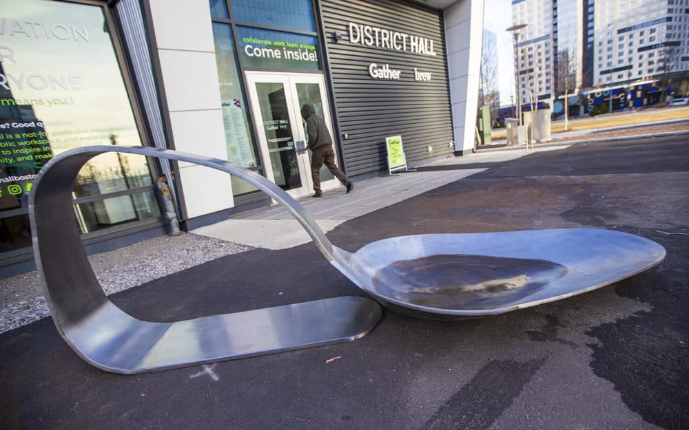 The 800-pound, 11-foot-long steel spoon created by artist Domenic Esposito outside in front of District Hall in the Seaport. (Jesse Costa/WBUR)