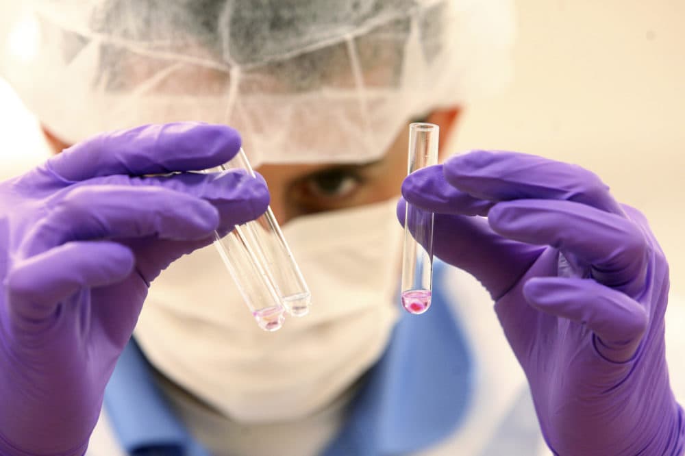 A criminalist examines for DNA evidence at a lab in the NYC Office of Chief Medical Examiner, Friday, June 4, 2010, in New York. (Mary Altaffer/AP)